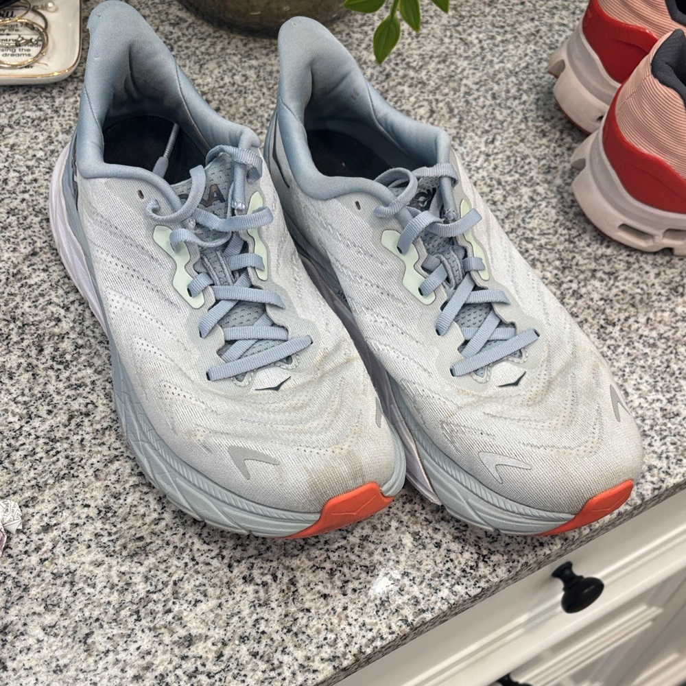 Hoka Light Gray and Orange Athletic Shoes